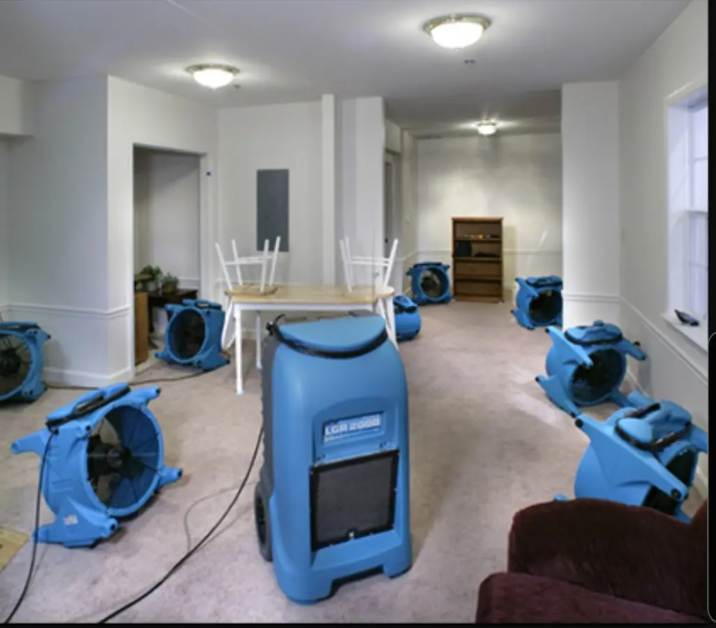 Air movers and dehumidifier setup for Water Damage Restoration in Sky Lake